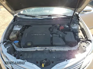 2013 Lincoln MKZ z VIN 3LN6L2GK6DR827247, wystawiony jako Copart lot #58029095 z przebiegiem 159 174 mil mil oraz Szkoda całkowita • Salvage title. Historia ofert i sprzedaży dostępna na DreamBid. Obrazek 11.