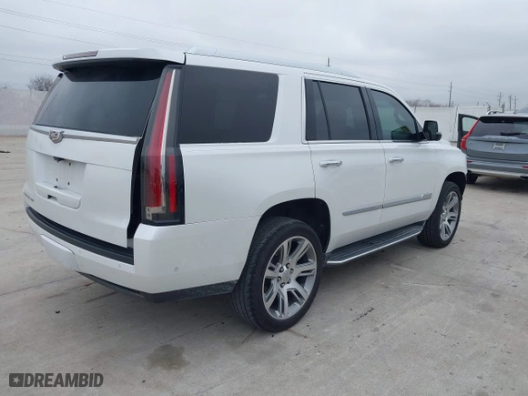 2018 Cadillac Escalade Luxury with VIN 1GYS3BKJ2JR223679, listed as a IAAI auction lot 41429770 with 76,440 mi miles. Bid and sale history available at carsss.com. Image 4.