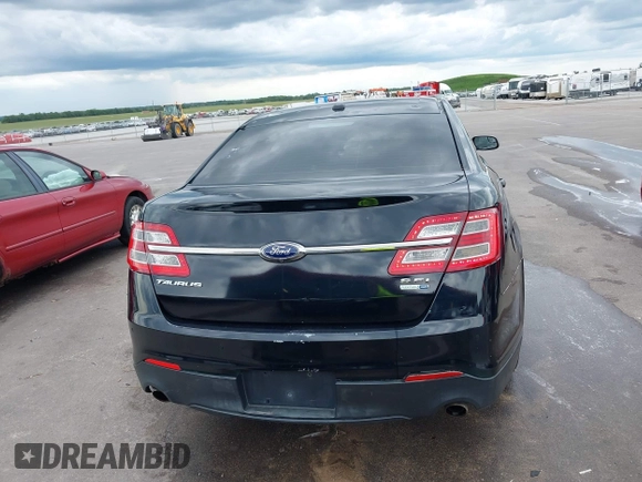 2015 Ford Taurus SEL with VIN 1FAHP2H85FG108575, listed as a IAAI auction lot 42514846 with 209,478 mi miles and . Bid and sale history available at DreamBid. Image 16.