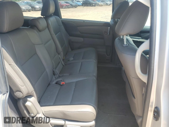 2014 Honda Odyssey EX-L z VIN 5FNRL5H66EB045019, wystawiony jako Copart lot #62899125 z przebiegiem 179 298 mil mil oraz Szkoda całkowita • Salvage title. Historia ofert i sprzedaży dostępna na DreamBid. Obrazek 11.