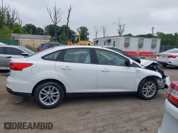 2018 Ford Focus SE z VIN 1FADP3F24JL247003, wystawiony jako IAAI lot #42531969 z przebiegiem 55 344 mil mil oraz . Historia ofert i sprzedaży dostępna na DreamBid. Obrazek 13.