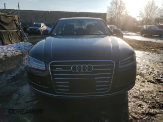 2015 Audi A8 z VIN WAUJGAFD4FN028750, wystawiony jako Copart lot #89099265 z przebiegiem 44 149 mil mil oraz Szkoda całkowita • Salvage title. Historia ofert i sprzedaży dostępna na DreamBid. Obrazek 5.