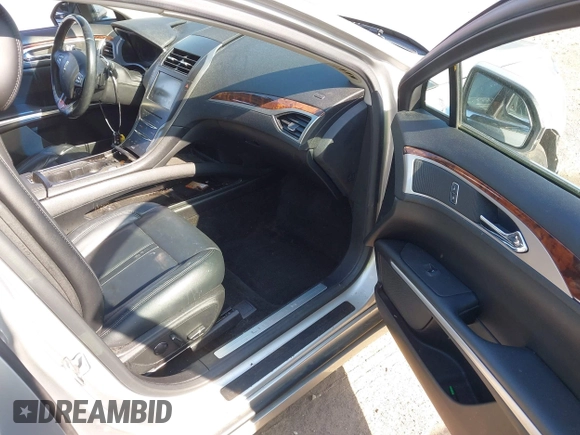 2015 Lincoln MKZ with VIN 3LN6L2G94FR608299, listed as a IAAI auction lot 42103338 with 96,955 mi miles and . Bid and sale history available at DreamBid. Image 5.