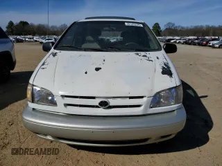 1999 Toyota Sienna LE with VIN 4T3ZF13C0XU144476, listed as a Copart auction lot 48185235 with 183,940 mi miles and Salvage title. Bid and sale history available at DreamBid. Image 5.