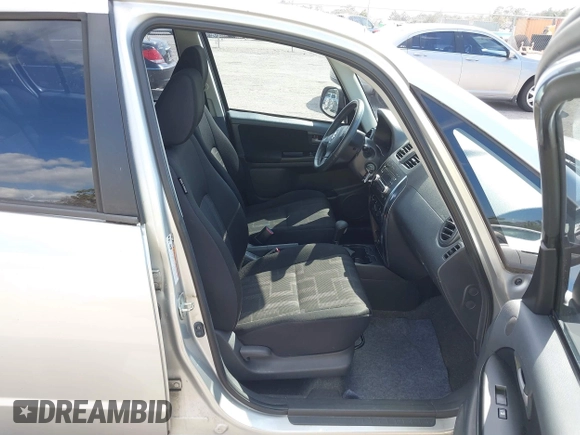 2012 Suzuki SX4 LE with VIN JS2YC5A30C6304324, listed as a IAAI auction lot 41585174 with 111,471 mi miles. Bid and sale history available at carsss.com. Image 5.