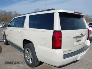 2015 Chevrolet Suburban LTZ with VIN 1GNSCKKC2FR741040, listed as a IAAI auction lot 41709574 with 87,795 mi miles and . Bid and sale history available at DreamBid. Image 3.