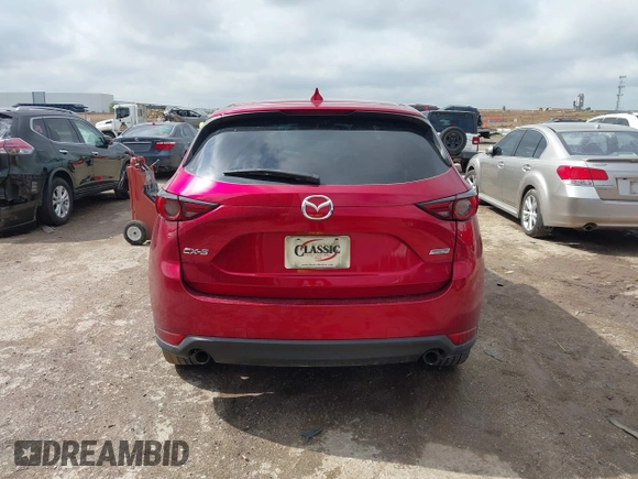 2018 Mazda CX-5 Grand Touring with VIN JM3KFADM7J1357401, listed as a IAAI auction lot 42106012 with 119,420 mi miles and . Bid and sale history available at DreamBid. Image 16.