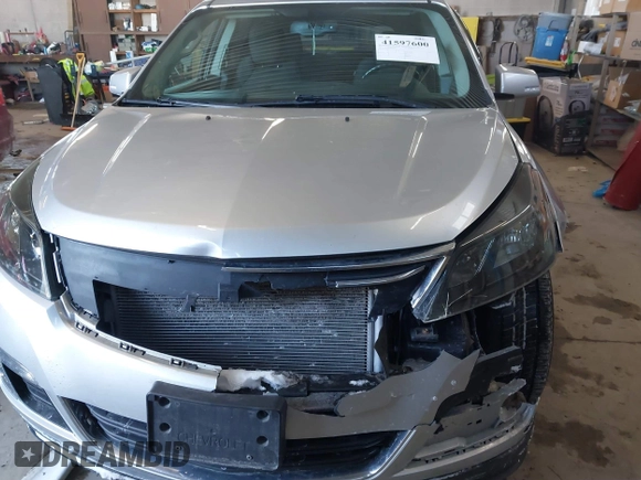 2015 Chevrolet Traverse LT with VIN 1GNKVHKD3FJ126405, listed as a IAAI auction lot 41597600 with 188,558 mi miles and . Bid and sale history available at DreamBid. Image 6.