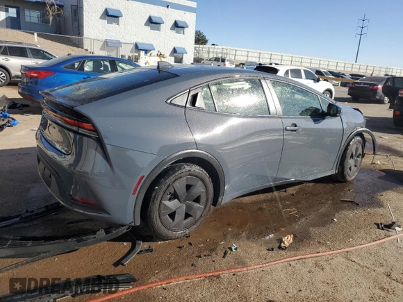 2024 Toyota Prius LE z VIN JTDACAAU2R3028428, wystawiony jako Copart lot #47221845 z przebiegiem Nie podano mil oraz Nie do naprawy • Non repairable. Historia ofert i sprzedaży dostępna na DreamBid. Obrazek 3.