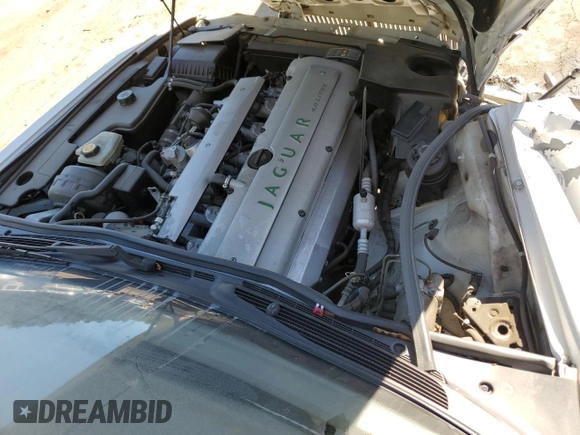 1996 Jaguar XJ with VIN SAJHX1747TC767829, listed as a Copart auction lot 76677444 with Not provided miles and Salvage title. Bid and sale history available at DreamBid. Image 11.
