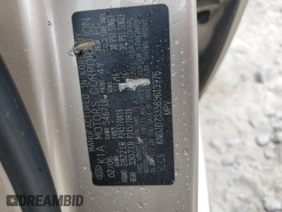 2006 Kia Sorento LX z VIN KNDJD733565613976, wystawiony jako Copart lot #54896005 z przebiegiem 140 198 mil mil oraz Szkoda całkowita • Salvage title. Historia ofert i sprzedaży dostępna na DreamBid. Obrazek 13.