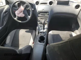 2003 Toyota Celica GT z VIN JTDDR32TX30165929, wystawiony jako Copart lot #59123525 z przebiegiem 222 623 mil mil oraz Szkoda całkowita • Salvage title. Historia ofert i sprzedaży dostępna na DreamBid. Obrazek 8.