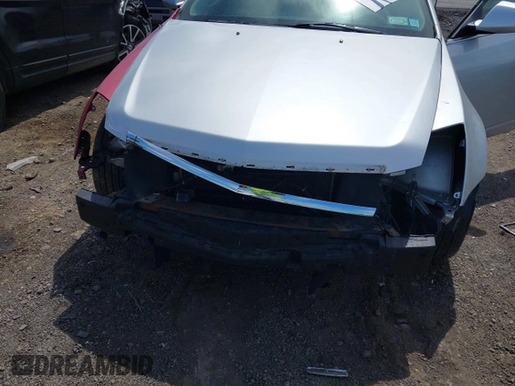 2012 Cadillac CTS Performance z VIN 1G6DJ5E31C0101165, wystawiony jako IAAI lot #42314189 z przebiegiem 157 313 mil mil oraz . Historia ofert i sprzedaży dostępna na DreamBid. Obrazek 6.