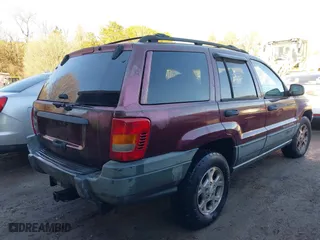 2001 Jeep Grand Cherokee Laredo with VIN 1J4GW48S11C578001, listed as a IAAI auction lot 41671318 with 263,694 mi miles. Bid and sale history available at carsss.com. Image 4.