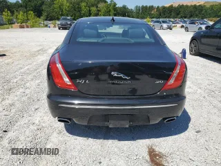 2014 Jaguar XJ Portfolio with VIN SAJWA2GZ2E8V66906, listed as a Copart auction lot 64888135 with 166,194 mi miles and Clean title. Bid and sale history available at DreamBid. Image 6.