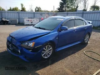 2015 Mitsubishi Lancer SE with VIN JA32V2FW3FU606202, listed as a Copart auction lot 70142394 with 129,336 mi miles and Salvage Title. Bid and sale history available at carsss.com. Image 1.