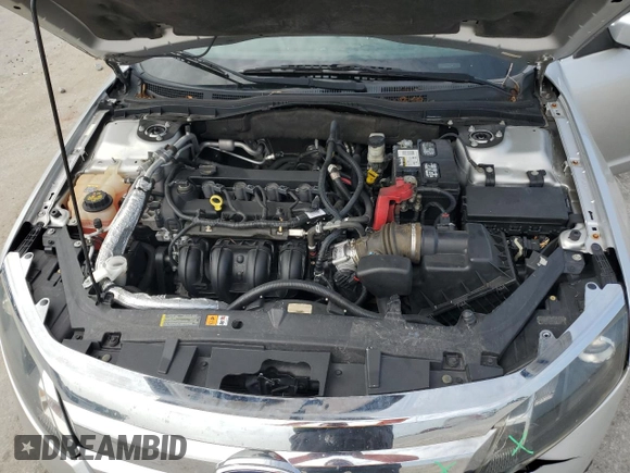 2012 Ford Fusion SE z VIN 3FAHP0HA1CR218938, wystawiony jako Copart lot #59588135 z przebiegiem 111 243 mil mil oraz Szkoda całkowita • Salvage title. Historia ofert i sprzedaży dostępna na DreamBid. Obrazek 11.