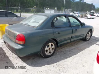 1999 Hyundai Sonata GLS with VIN KMHWF35V6XA107973, listed as a IAAI auction lot 42119318 with 174,231 mi miles. Bid and sale history available at carsss.com. Image 4.
