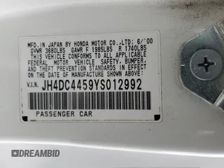 2000 Acura Integra LS with VIN JH4DC4459YS012992, listed as a Copart auction lot 53804615 with 271,223 mi miles and Salvage title. Bid and sale history available at DreamBid. Image 13.