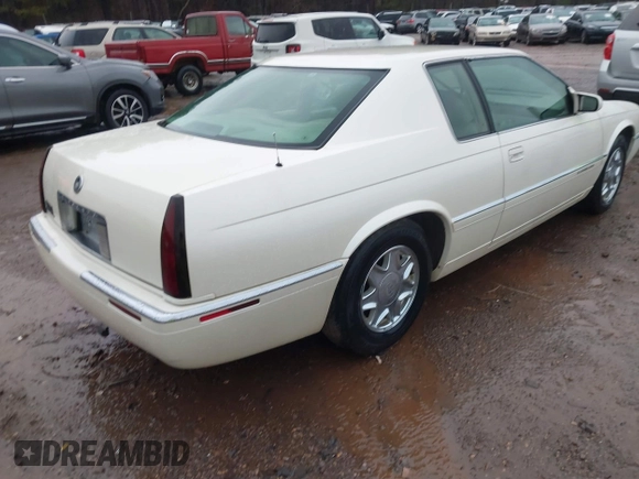 1997 Cadillac Eldorado ESC z VIN 1G6EL12Y6VU614754, wystawiony jako IAAI lot #41543611 z przebiegiem 73 273 mil mil oraz . Historia ofert i sprzedaży dostępna na DreamBid. Obrazek 4.