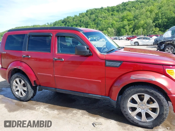 2010 Dodge Nitro Heat z VIN 1D4PU4GK5AW174777, wystawiony jako IAAI lot #42290362 z przebiegiem 165 537 mil mil oraz . Historia ofert i sprzedaży dostępna na DreamBid. Obrazek 17.