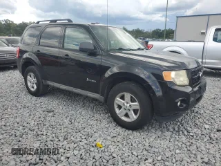 2009 Ford Escape Hybrid with VIN 1FMCU593X9KA79055, listed as a Copart auction lot 62681375 with 136,737 mi miles and Clean title. Bid and sale history available at DreamBid. Image 4.