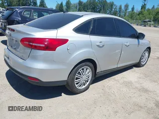 2016 Ford Focus SE with VIN 1FADP3F24GL286330, listed as a IAAI auction lot 42433516 with 130,814 mi miles and . Bid and sale history available at DreamBid. Image 4.