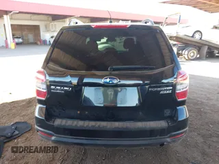 2015 Subaru Forester 2.5i Premium with VIN JF2SJADC8FG804998, listed as a IAAI auction lot 41885715 with 70,636 mi miles. Bid and sale history available at carsss.com. Image 16.