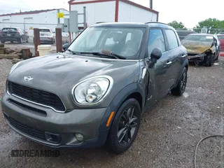 2011 MINI Countryman S with VIN WMWZC5C53BWM11022, listed as a IAAI auction lot 42249403 with 173,718 mi miles and . Bid and sale history available at DreamBid. Image 17.