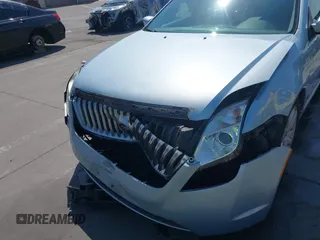 2010 Mercury Milan Hybrid with VIN 3MEDM0L35AR641477, listed as a IAAI auction lot 42443628 with 102,890 mi miles and . Bid and sale history available at DreamBid. Image 6.