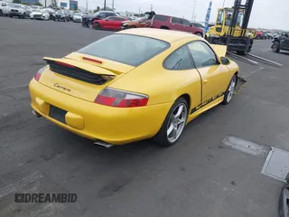 2003 Porsche 911 Carrera with VIN WP0AA29943S623144, listed as a IAAI auction lot 42110995 with 59,427 mi miles. Bid and sale history available at carsss.com. Image 4.