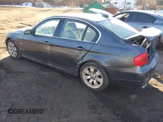 2006 BMW 3 Series 330xi with VIN WBAVD33586KV60409, listed as a IAAI auction lot 41436848 with 999,999 mi miles. Bid and sale history available at carsss.com. Image 3.