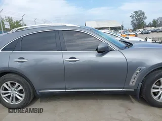 2014 Infiniti QX70 with VIN JN8CS1MU8EM450428, listed as a IAAI auction lot 42233727 with 88,342 mi miles and . Bid and sale history available at DreamBid. Image 13.