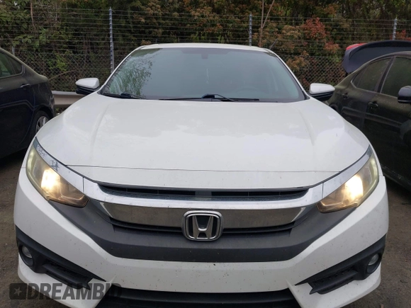 2016 Honda Civic Sedan EX-T with VIN 2HGFC1F33GH651560, listed as a IAAI auction lot 41957232 with 157,912 mi miles. Bid and sale history available at carsss.com. Image 12.