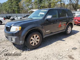 2008 Mazda Tribute ES with VIN 4F2CZ06118KM21700, listed as a Copart auction lot 50431615 with 229,544 mi miles and Salvage Title. Bid and sale history available at carsss.com. Image 1.