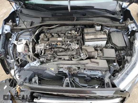 2023 Toyota Corolla Cross XLE with VIN 7MUDAABG1PV052040, listed as a Copart auction lot 51840315 with 43,228 mi miles and Salvage title. Bid and sale history available at DreamBid. Image 13.