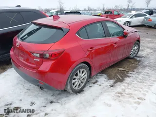 2016 Mazda Mazda3 i Grand Touring with VIN 3MZBM1N77GM245567, listed as a IAAI auction lot 41330883 with 128,423 mi miles. Bid and sale history available at carsss.com. Image 4.