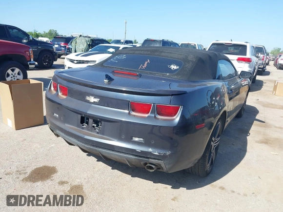 2013 Chevrolet Camaro LT z VIN 2G1FC3D33D9134173, wystawiony jako IAAI lot #41954984 z przebiegiem 157 919 mil mil oraz . Historia ofert i sprzedaży dostępna na DreamBid. Obrazek 4.