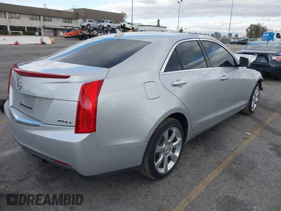 2013 Cadillac ATS Luxury with VIN 1G6AB5RX4D0154991, listed as a IAAI auction lot 41688976 with 136,238 mi miles and . Bid and sale history available at DreamBid. Image 4.