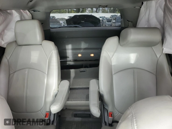 2014 GMC Acadia SLT z VIN 1GKKVRKDXEJ357660, wystawiony jako Copart lot #52595794 z przebiegiem 180 509 mil mil oraz Szkoda całkowita • Salvage title. Historia ofert i sprzedaży dostępna na DreamBid. Obrazek 10.