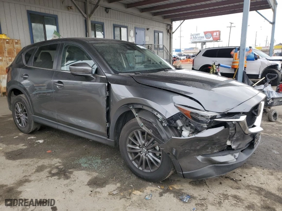 2020 Mazda CX-5 Touring with VIN JM3KFACM6L0797748, listed as a Copart auction lot 44573645 with 104,094 mi miles and Salvage Title. Bid and sale history available at carsss.com. Image 4.