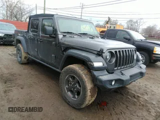 2021 Jeep Gladiator Sport S z VIN 1C6HJTAG3ML597041, wystawiony jako IAAI lot #41714640 z przebiegiem 46 402 mil mil oraz . Historia ofert i sprzedaży dostępna na DreamBid. Obrazek 1.