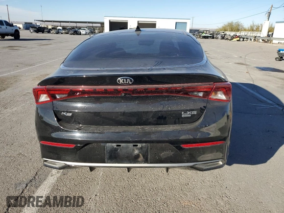 2021 Kia K5 LXS with VIN 5XXG14J20MG022815, listed as a Copart auction lot 83011334 with 77,822 mi miles and Salvage Title. Bid and sale history available at carsss.com. Image 6.
