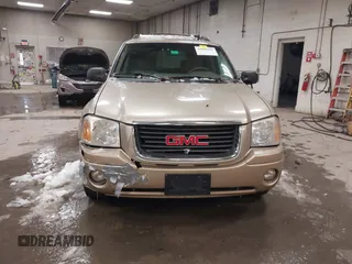2004 GMC Envoy SLT with VIN 1GKET16S746148679, listed as a IAAI auction lot 41602991 with 196,621 mi miles and . Bid and sale history available at DreamBid. Image 13.