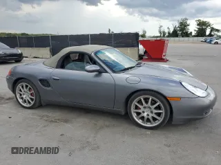 2001 Porsche Boxster S with VIN WP0CB29891U660771, listed as a Copart auction lot 61869675 with 99,065 mi miles and Clean title. Bid and sale history available at DreamBid. Image 4.