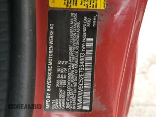 2014 MINI Hardtop with VIN WMWXM5C52ET934803, listed as a Copart auction lot 55284765 with 96,519 mi miles and Salvage title. Bid and sale history available at DreamBid. Image 12.