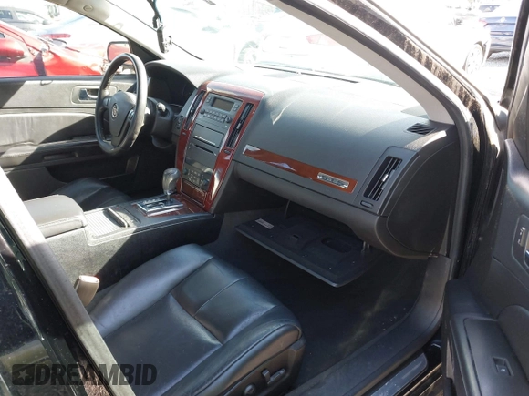 2005 Cadillac STS with VIN 1G6DW677250190268, listed as a IAAI auction lot 41702798 with 142,427 mi miles. Bid and sale history available at carsss.com. Image 5.