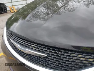 2017 Chrysler Pacifica Touring with VIN 2C4RC1DG9HR620973, listed as a IAAI auction lot 42250448 with 108,863 mi miles and . Bid and sale history available at DreamBid. Image 19.