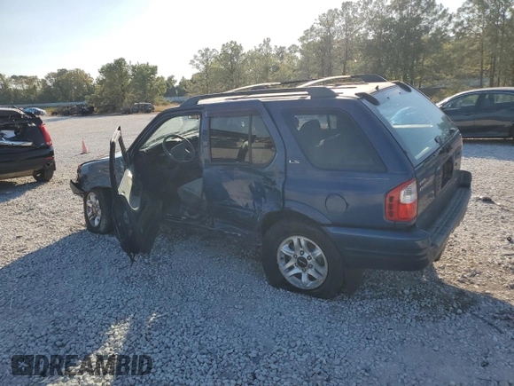 2002 Isuzu Rodeo S with VIN 4S2CK58W124307433, listed as a Copart auction lot 75447074 with 129,163 mi miles and Salvage title. Bid and sale history available at DreamBid. Image 2.