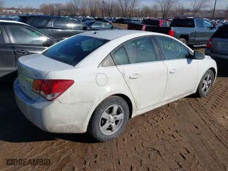 2014 Chevrolet Cruze LT with VIN 1G1PK5SB4E7358682, listed as a IAAI auction lot 41665391 with 141,485 mi miles. Bid and sale history available at carsss.com. Image 4.